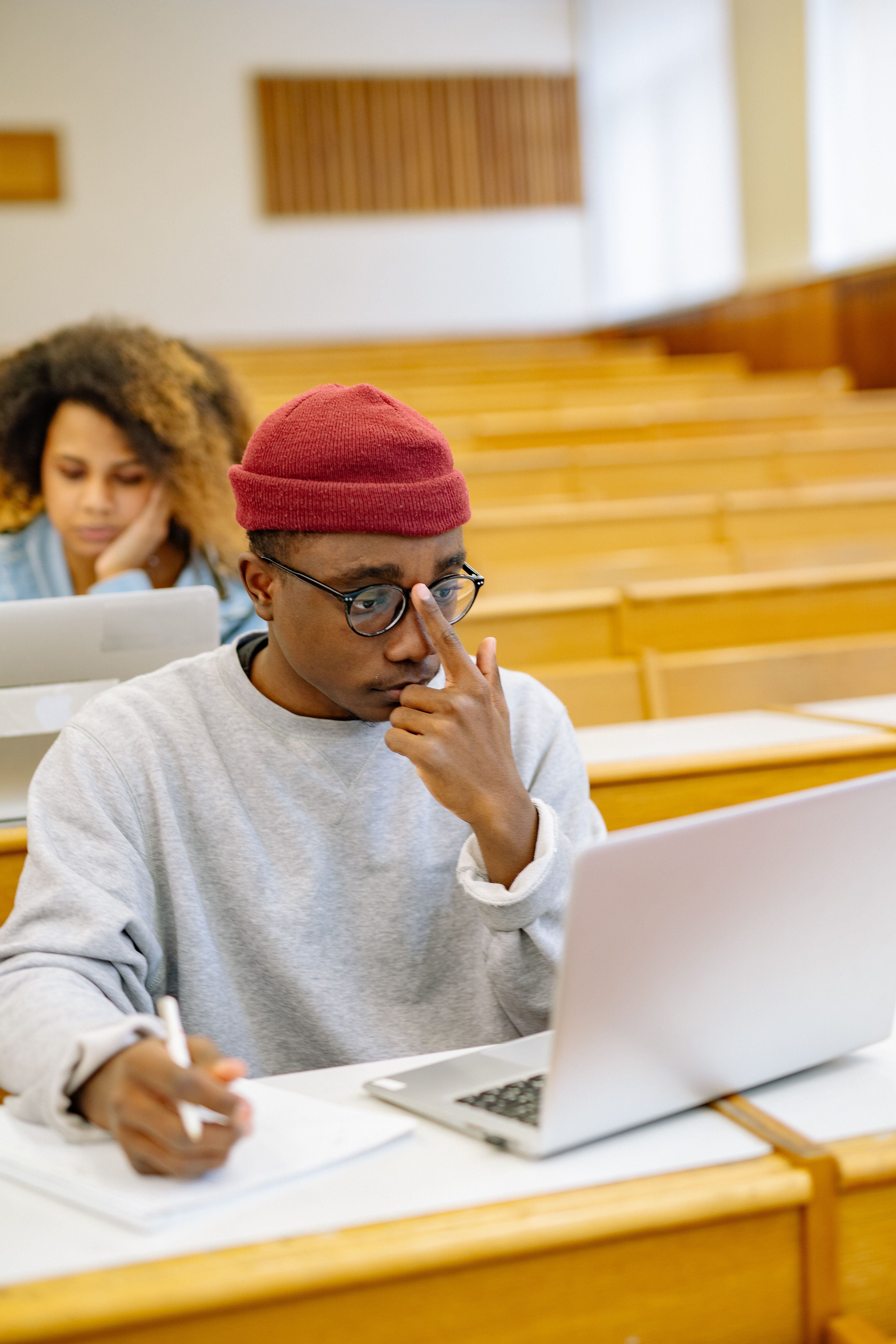 person reading on laptop